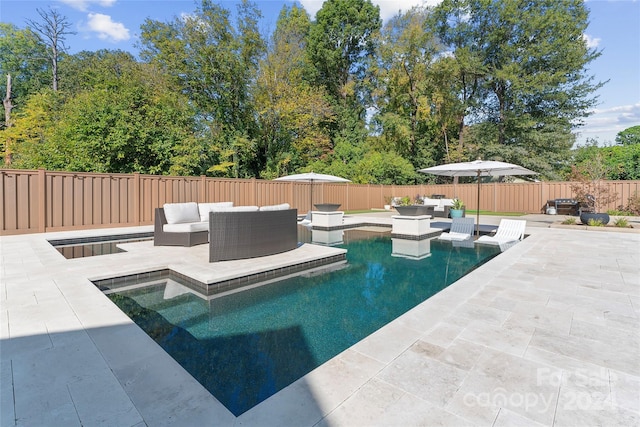 view of swimming pool with an outdoor hangout area and a patio area