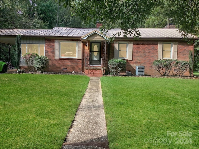 305 N Milford Dr, Salisbury, NC 28144 - ranch-style home featuring brick siding, a front yard, and a chimney