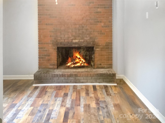 305 N Milford Dr, Salisbury, NC 28144 - detailed view of wood finished floors and a fireplace