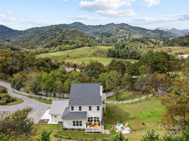 bird's eye view with a mountain view and a rural view