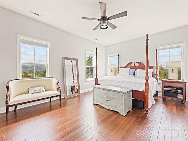 bedroom featuring dark wood-type flooring and ceiling fan