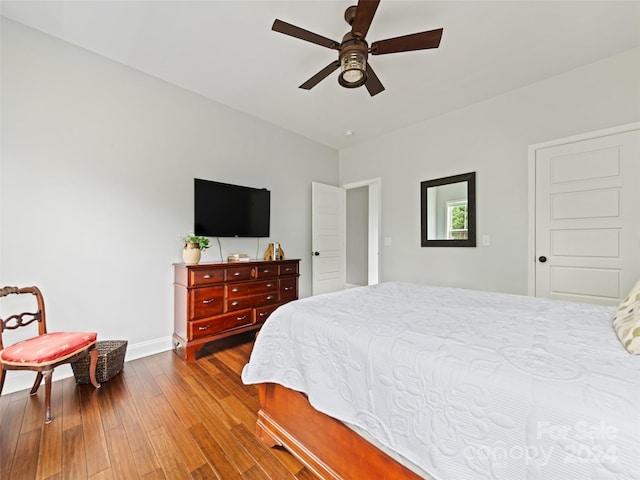 bedroom featuring wood-type flooring and ceiling fan