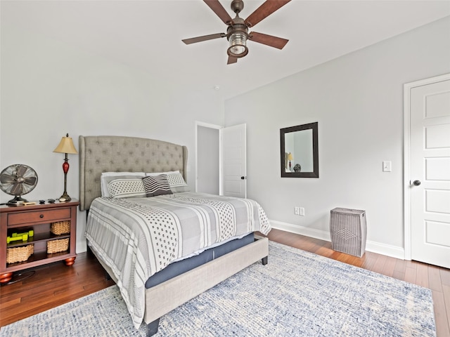 bedroom with wood-type flooring and ceiling fan