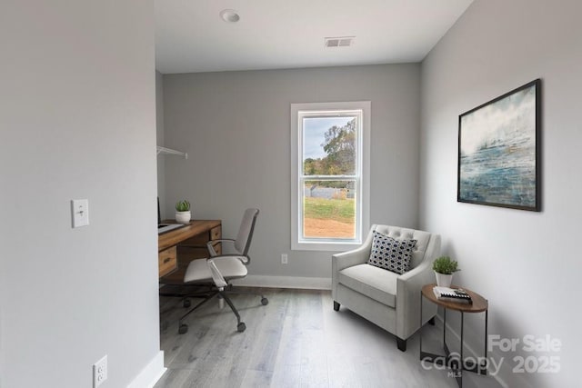 home office featuring light wood-type flooring