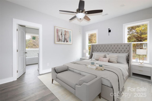 bedroom featuring hardwood / wood-style floors and ceiling fan