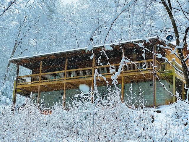 view of property's community featuring a wooden deck