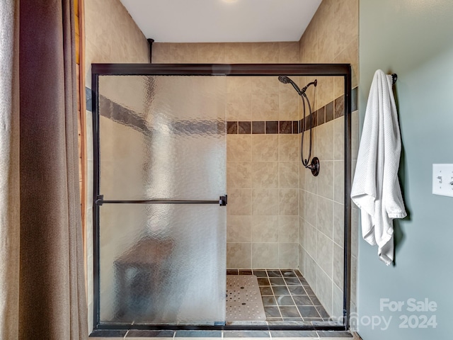 bathroom with an enclosed shower