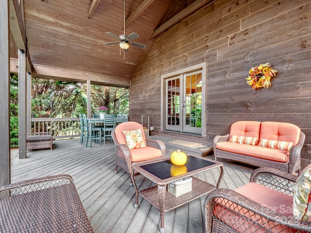 deck featuring ceiling fan and an outdoor hangout area