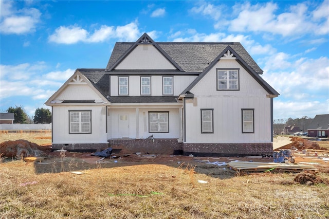 view of front of property with a shingled roof