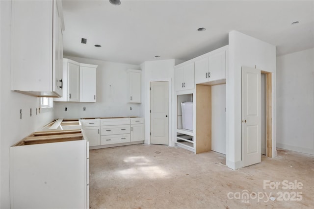 kitchen with white cabinetry