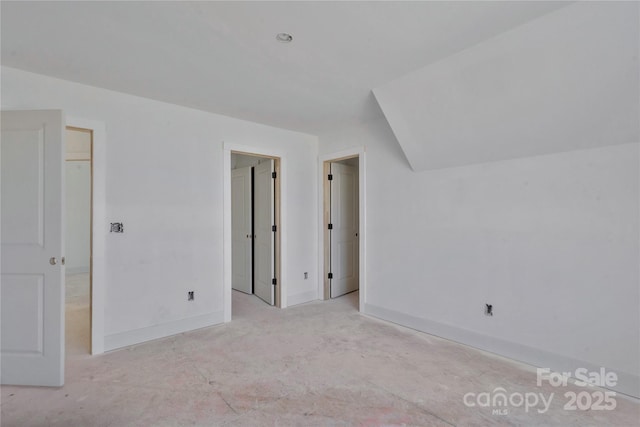 interior space featuring baseboards