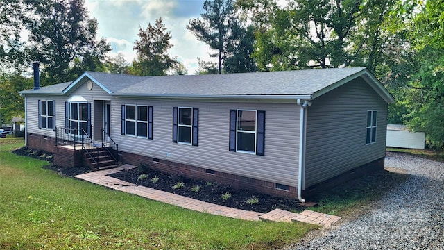 view of front of home featuring a front yard