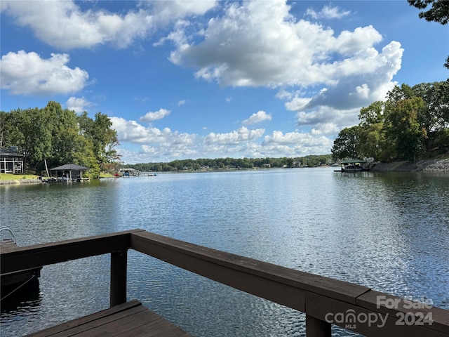 view of dock with a water view