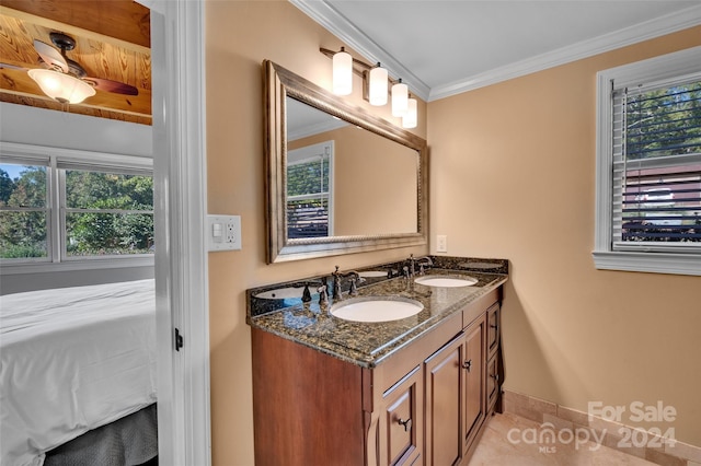 bathroom with tile patterned floors, ceiling fan, ornamental molding, and vanity