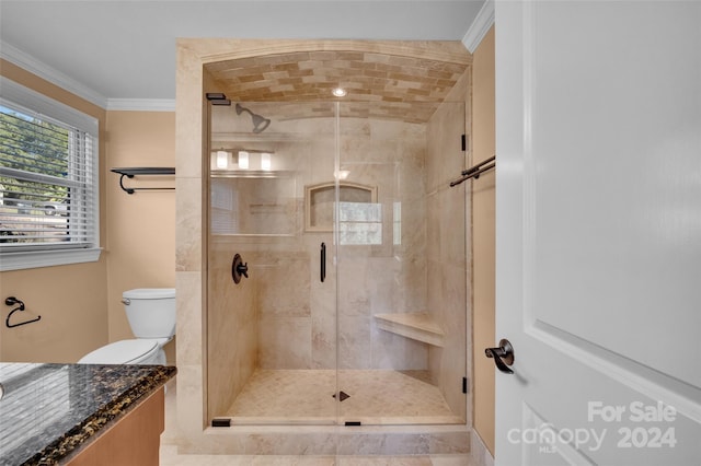 bathroom with crown molding, toilet, and walk in shower