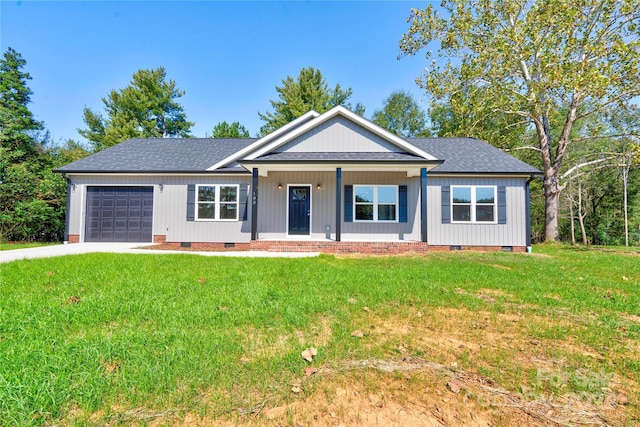 single story home with a garage, covered porch, and a front lawn