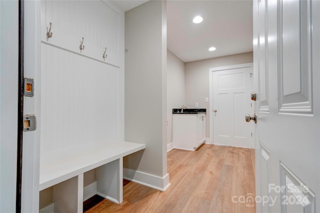 mudroom featuring light wood-type flooring