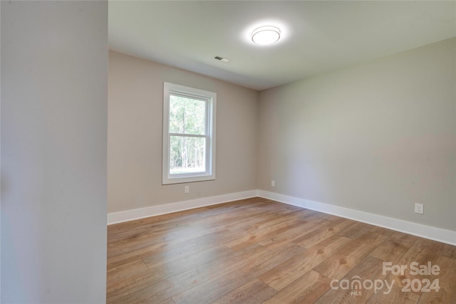 empty room featuring light hardwood / wood-style floors