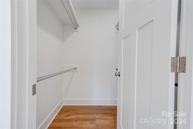 walk in closet featuring light wood-type flooring