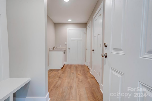 107 Falls St, Lawndale, NC 28090 - corridor featuring a sink, light wood-type flooring, recessed lighting, and baseboards