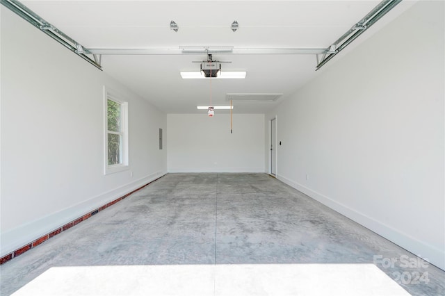 107 Falls St, Lawndale, NC 28090 - garage with electric panel, a garage door opener, and baseboards