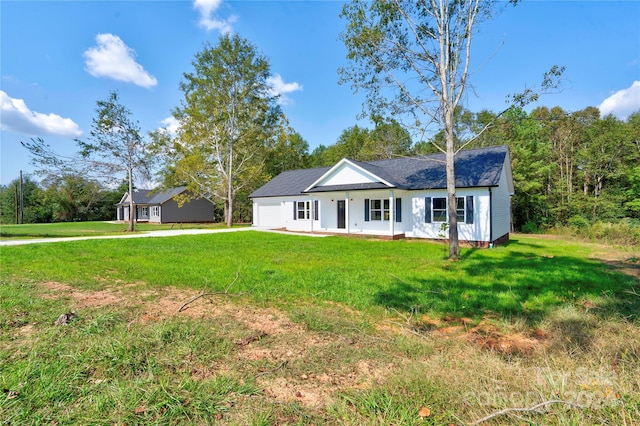 ranch-style house with a front yard