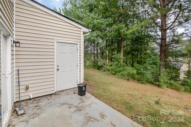 view of outbuilding with a yard