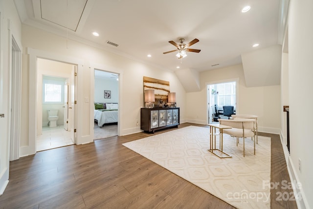 office with ceiling fan, ornamental molding, hardwood / wood-style floors, and a wealth of natural light