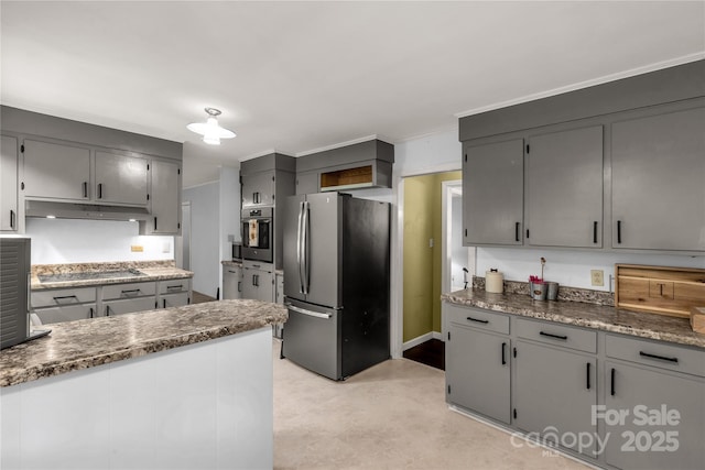 kitchen with stainless steel appliances and gray cabinetry