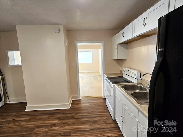 kitchen with dark wood-type flooring, sink, white cabinets, electric stove, and black refrigerator