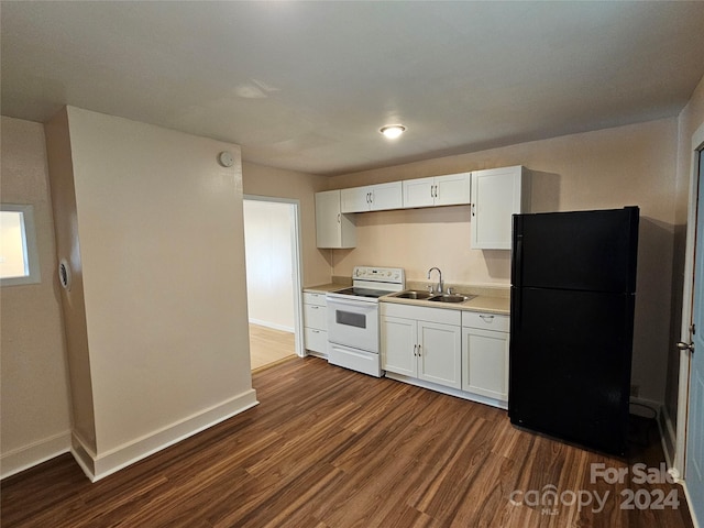 145 33rd St SW, Hickory, NC 28602 - kitchen featuring white range with electric cooktop, freestanding refrigerator, a sink, dark wood-style flooring, and white cabinets