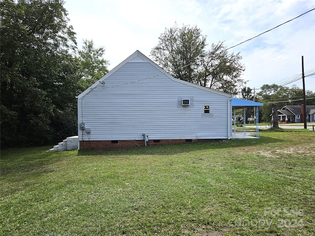 view of home's exterior featuring a lawn