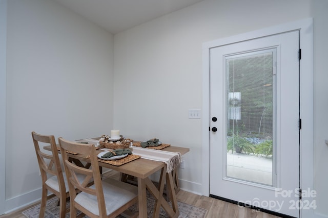 dining room with light hardwood / wood-style floors