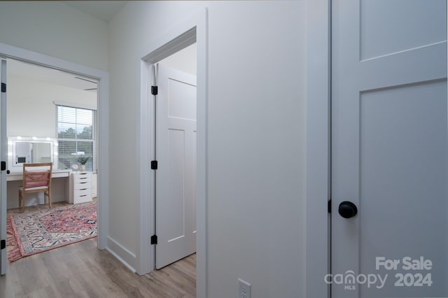 hallway featuring light hardwood / wood-style flooring