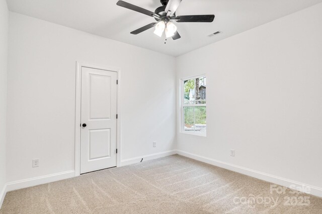 602 Meadow St, Spencer, NC 28159 - spare room featuring carpet floors and ceiling fan