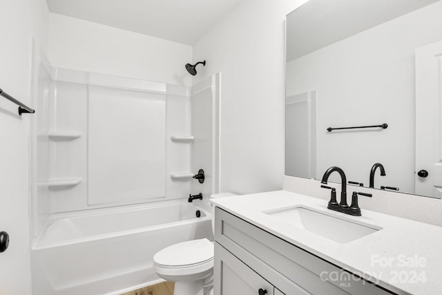 full bathroom with wood-type flooring, shower / bathtub combination, vanity, and toilet