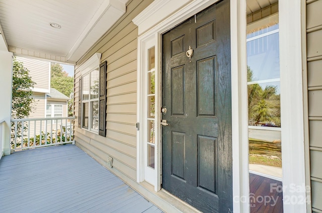 property entrance with a porch