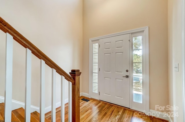 entryway with light hardwood / wood-style floors