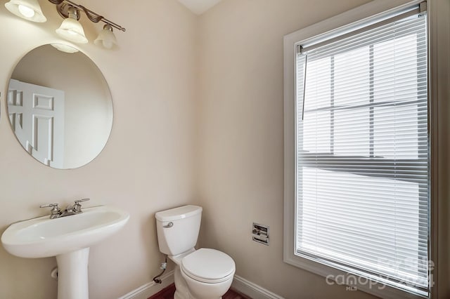 bathroom featuring toilet