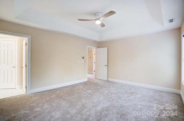 carpeted empty room with ceiling fan