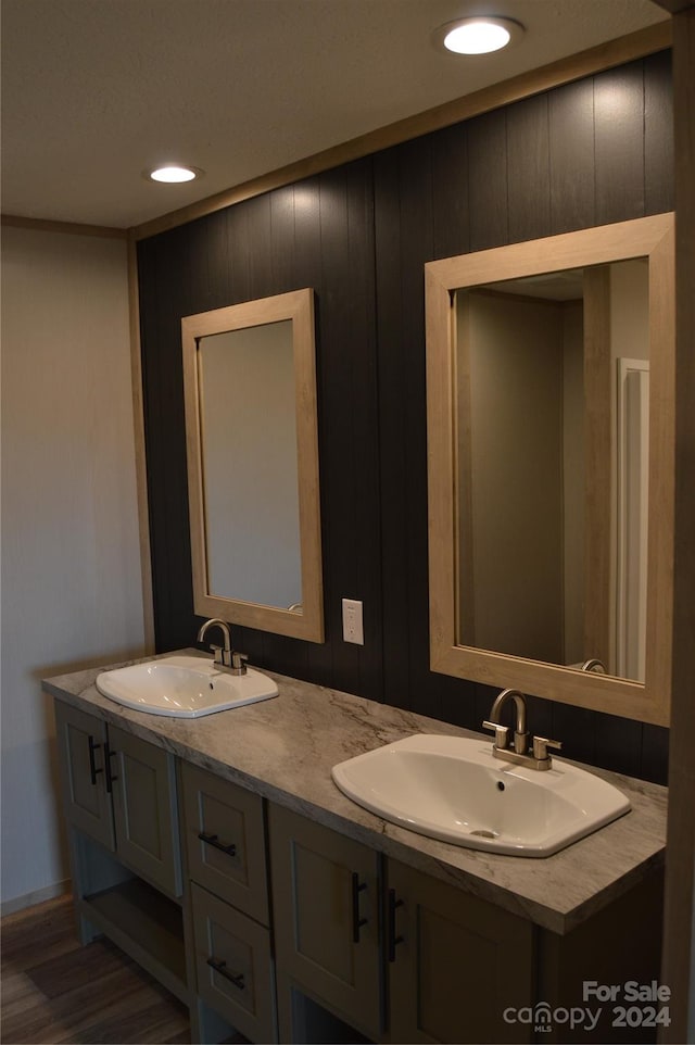 bathroom featuring vanity and hardwood / wood-style flooring