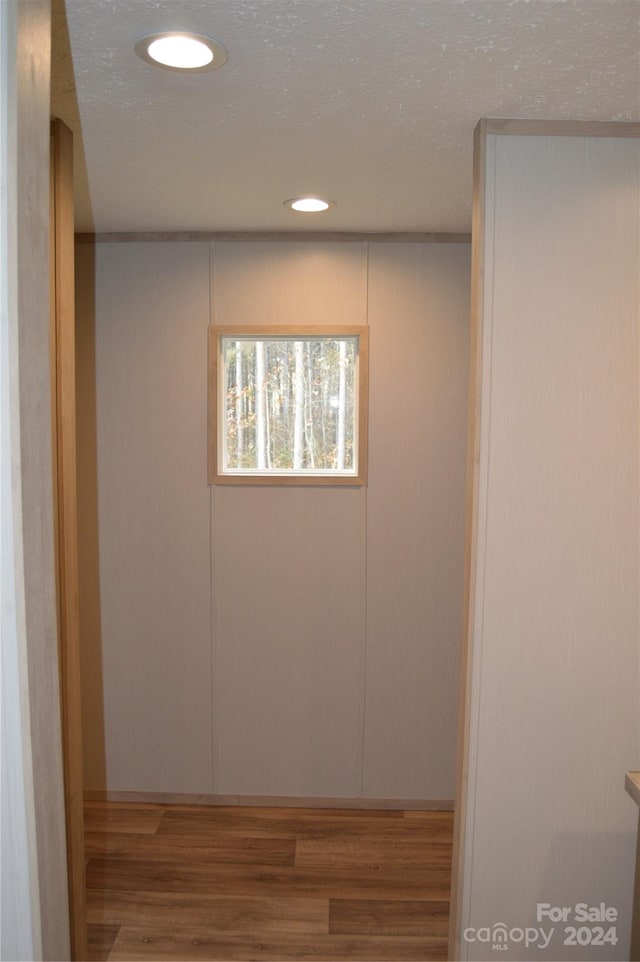 spare room featuring hardwood / wood-style floors