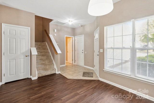 foyer featuring dark hardwood / wood-style floors