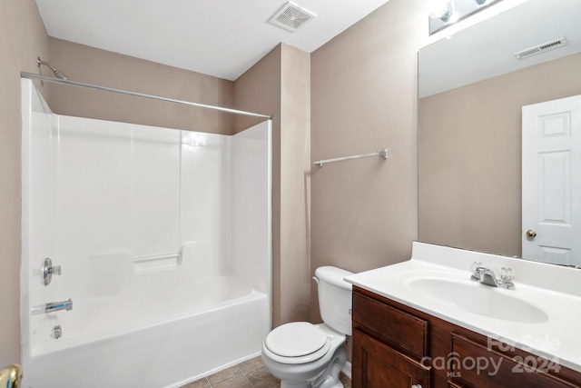 full bathroom featuring tile patterned floors,  shower combination, vanity, and toilet