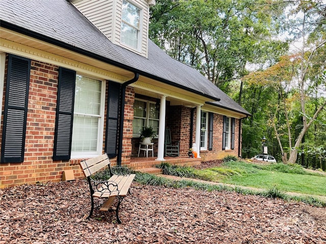 view of home's exterior featuring a lawn