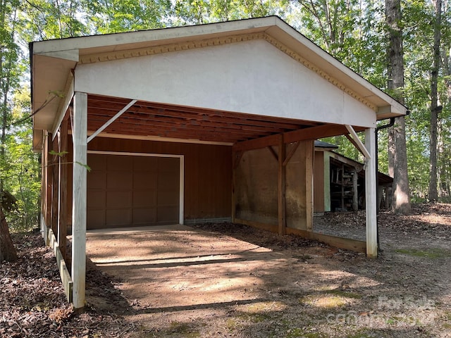 exterior space featuring a carport