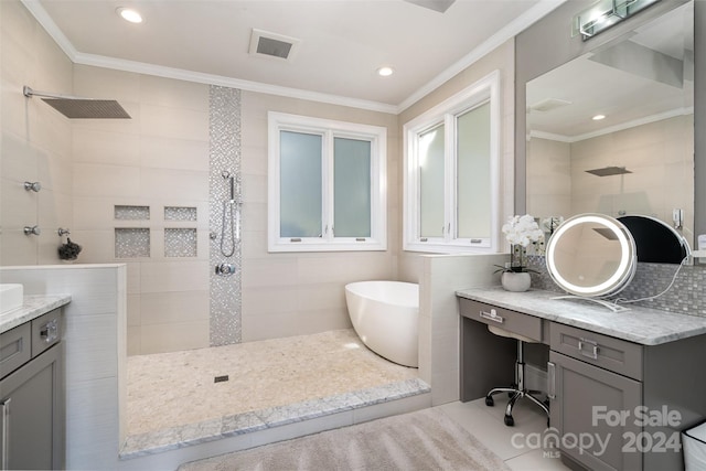 bathroom featuring ornamental molding, vanity, shower with separate bathtub, tile patterned floors, and tile walls