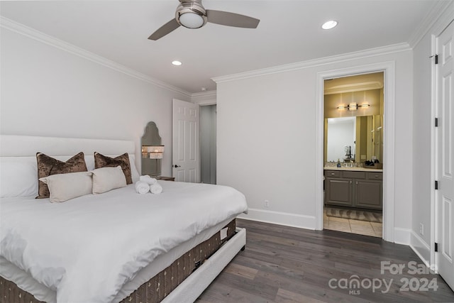 bedroom with connected bathroom, ceiling fan, dark hardwood / wood-style floors, and crown molding