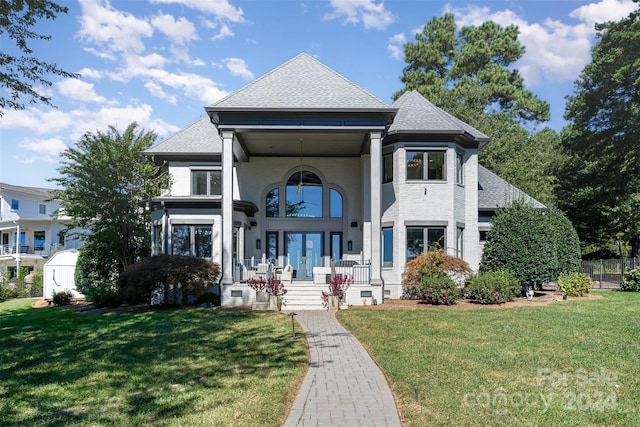 view of front of home with a front lawn