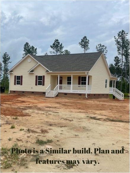 ranch-style home with a porch